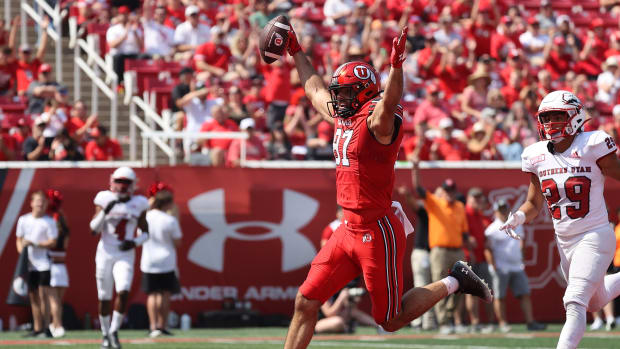Utah Utes tight end Thomas Yassmin (87) celebrates scoring a touchdown in the fourth quarter against the Southern Utah Thunderbirds at Rice-Eccles Stadium.
